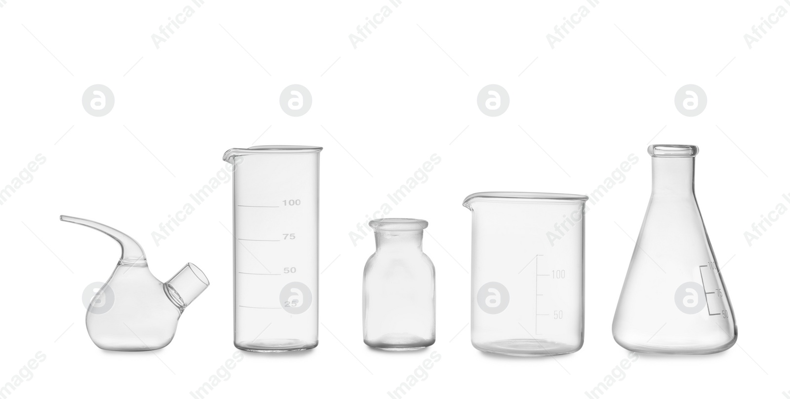 Photo of Clean empty laboratory glassware isolated on white