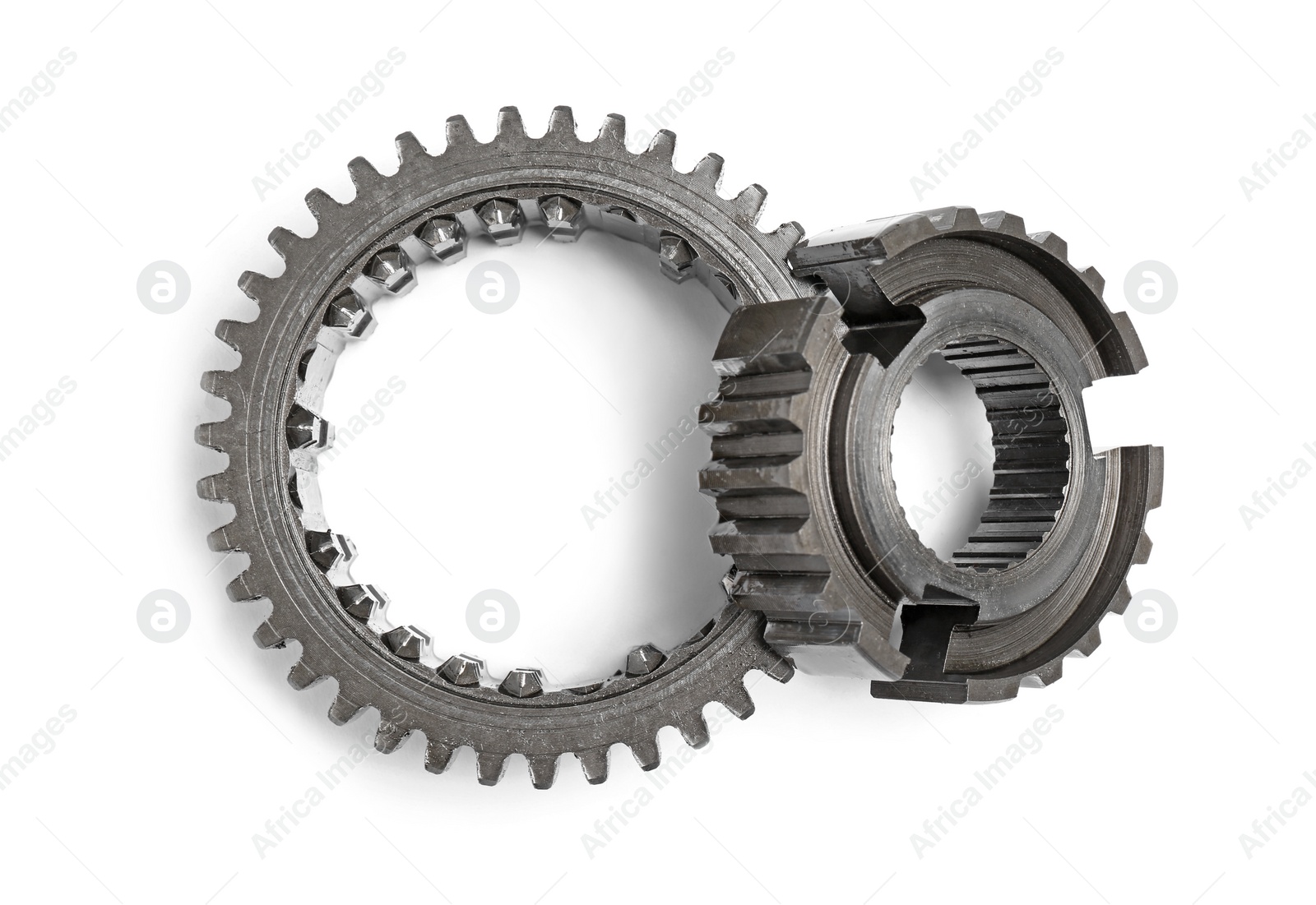 Photo of Stainless steel gears on white background, top view