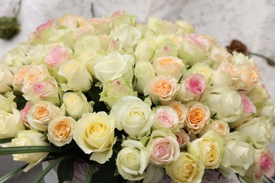 Photo of Bouquet of different beautiful roses, closeup view