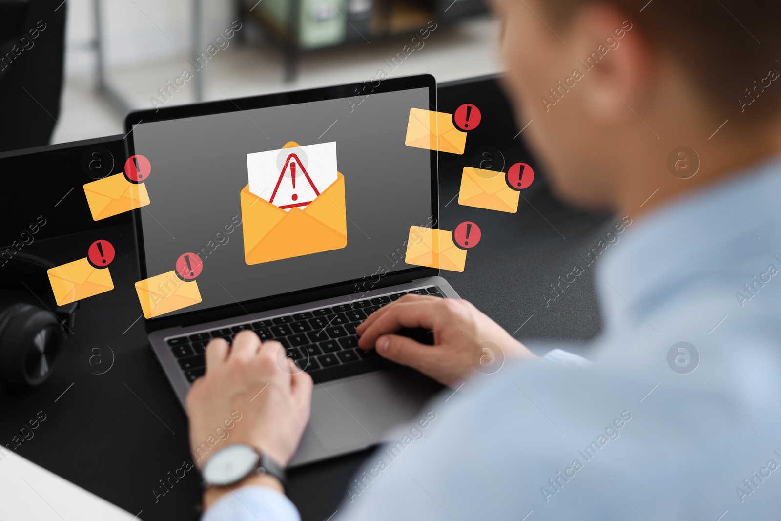 Image of Man using laptop at table, closeup. Spam message notifications, illustration