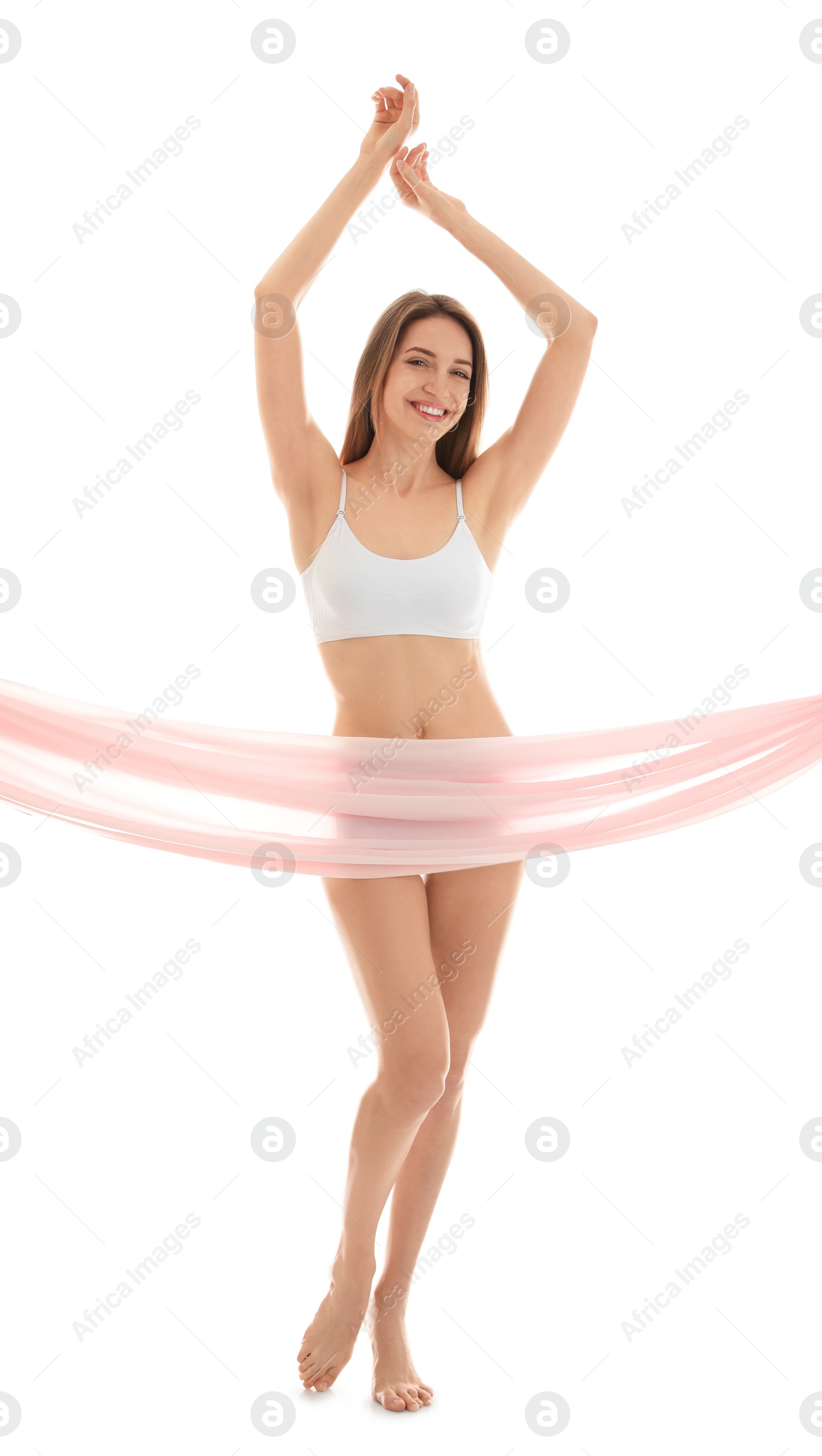 Photo of Young slim woman covering her body with fabric on white background