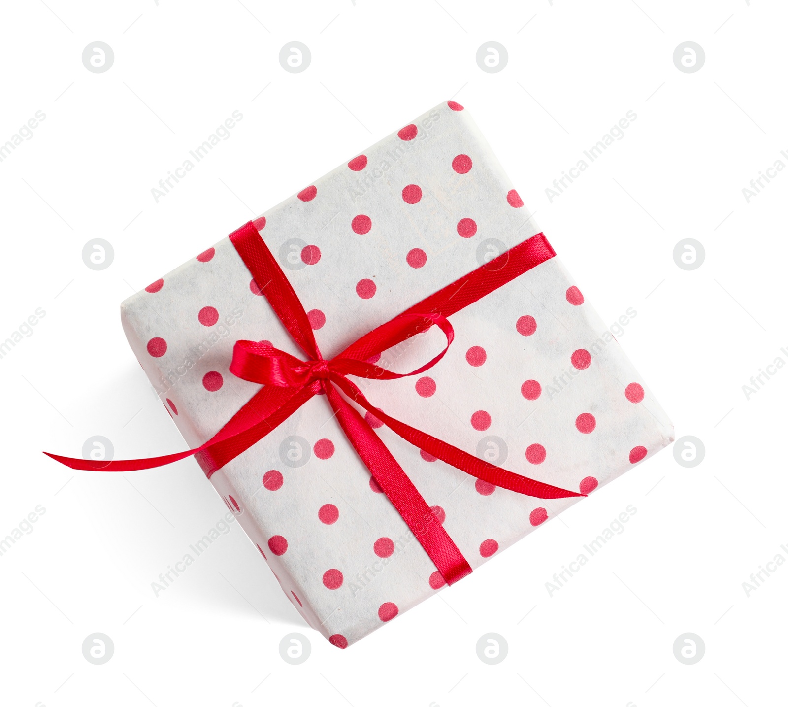 Photo of Beautifully wrapped gift box on white background, top view