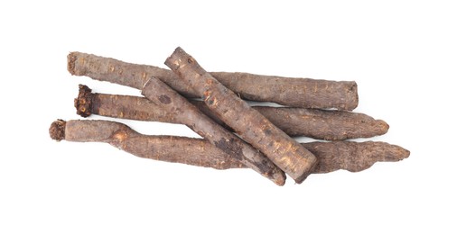 Raw salsify roots on white background, top view