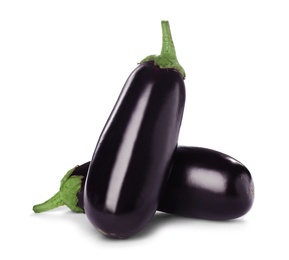 Photo of Tasty raw ripe eggplants on white background