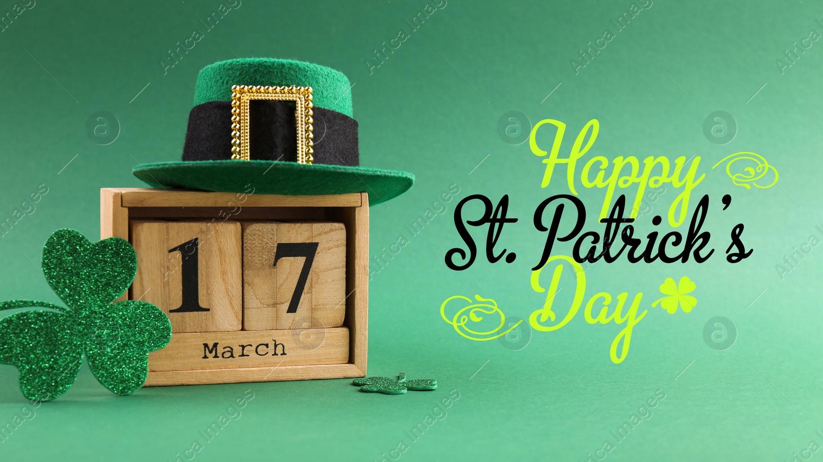 Image of Happy St. Patrick's day card. Wooden block calendar with date March 17, leprechaun hat and decorative clover leaves on green background