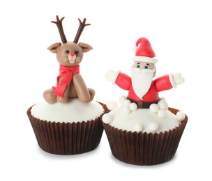 Photo of Beautiful Christmas cupcakes with Santa Claus and reindeer on white background