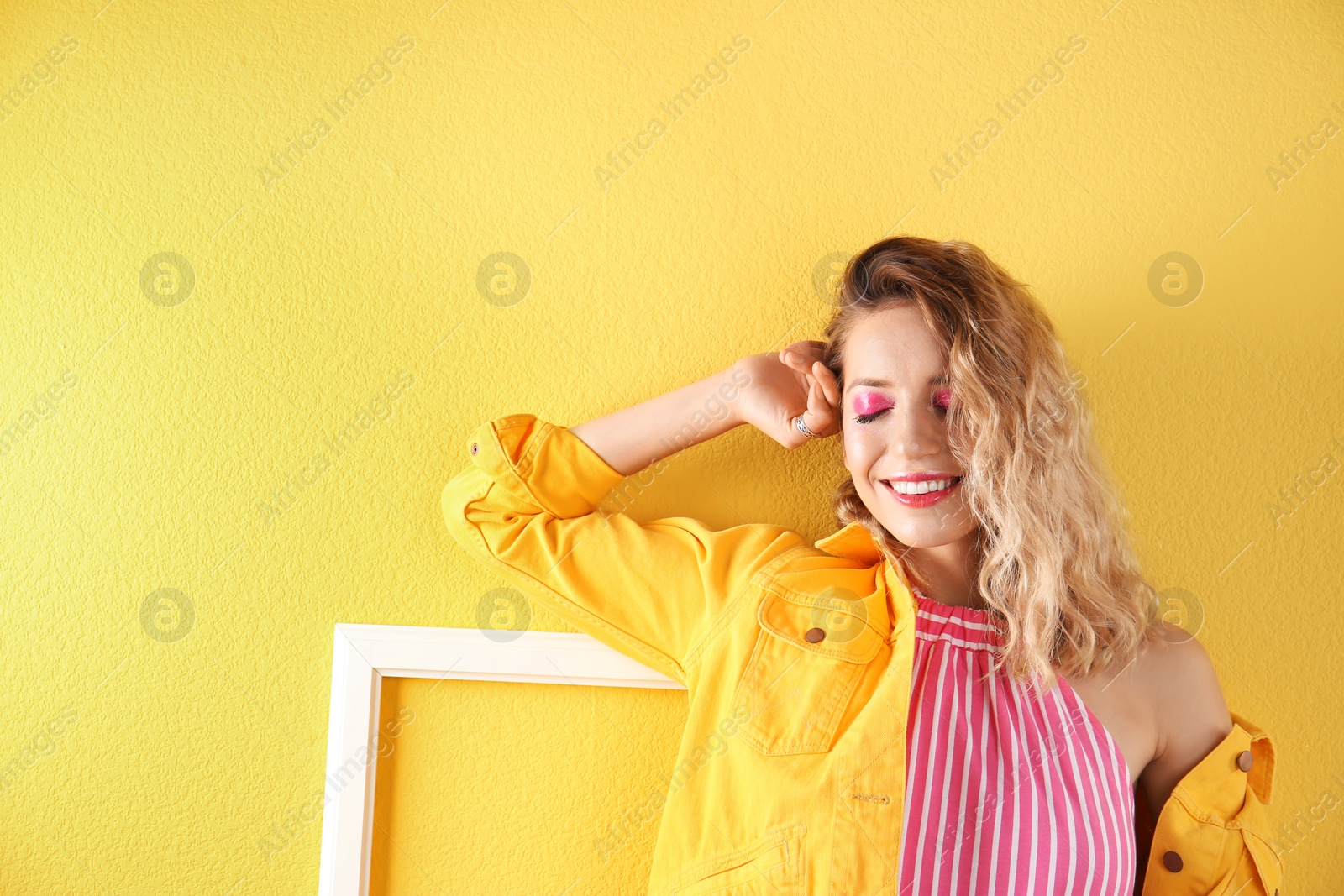 Photo of Beautiful young woman posing on color background. Summer fashion