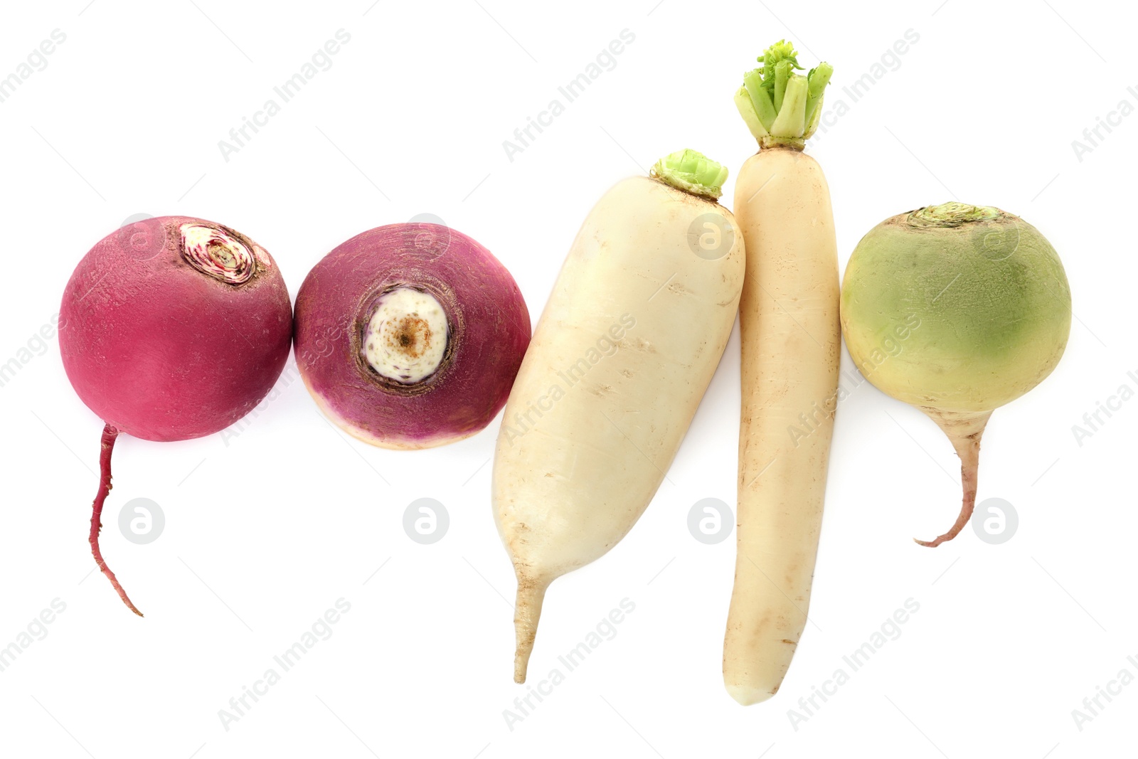 Photo of Different ripe turnips on white background, top view