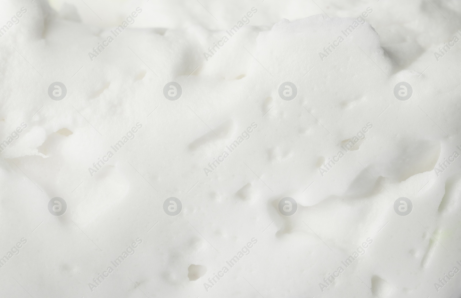 Photo of Closeup view of white slime. Antistress toy