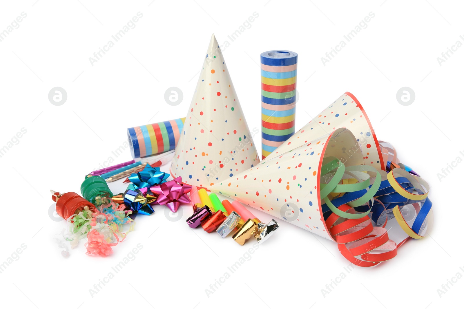 Photo of Party crackers and different festive items on white background