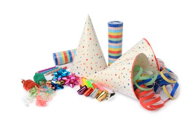 Photo of Party crackers and different festive items on white background
