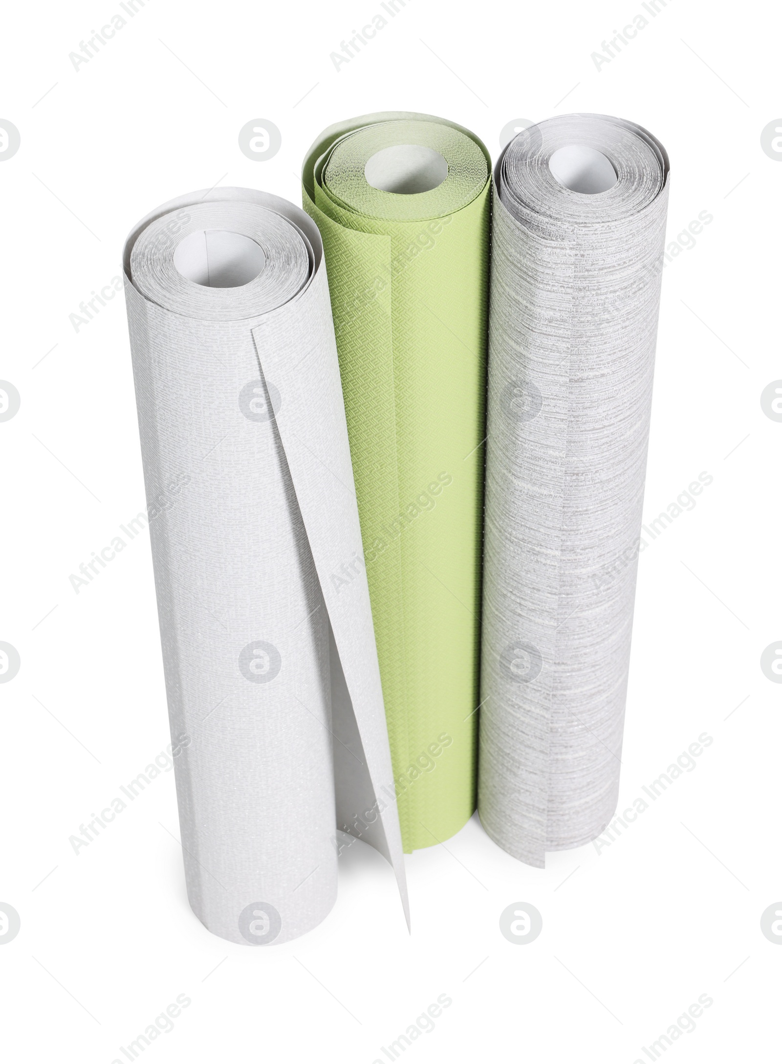 Photo of Three different wallpaper rolls isolated on white