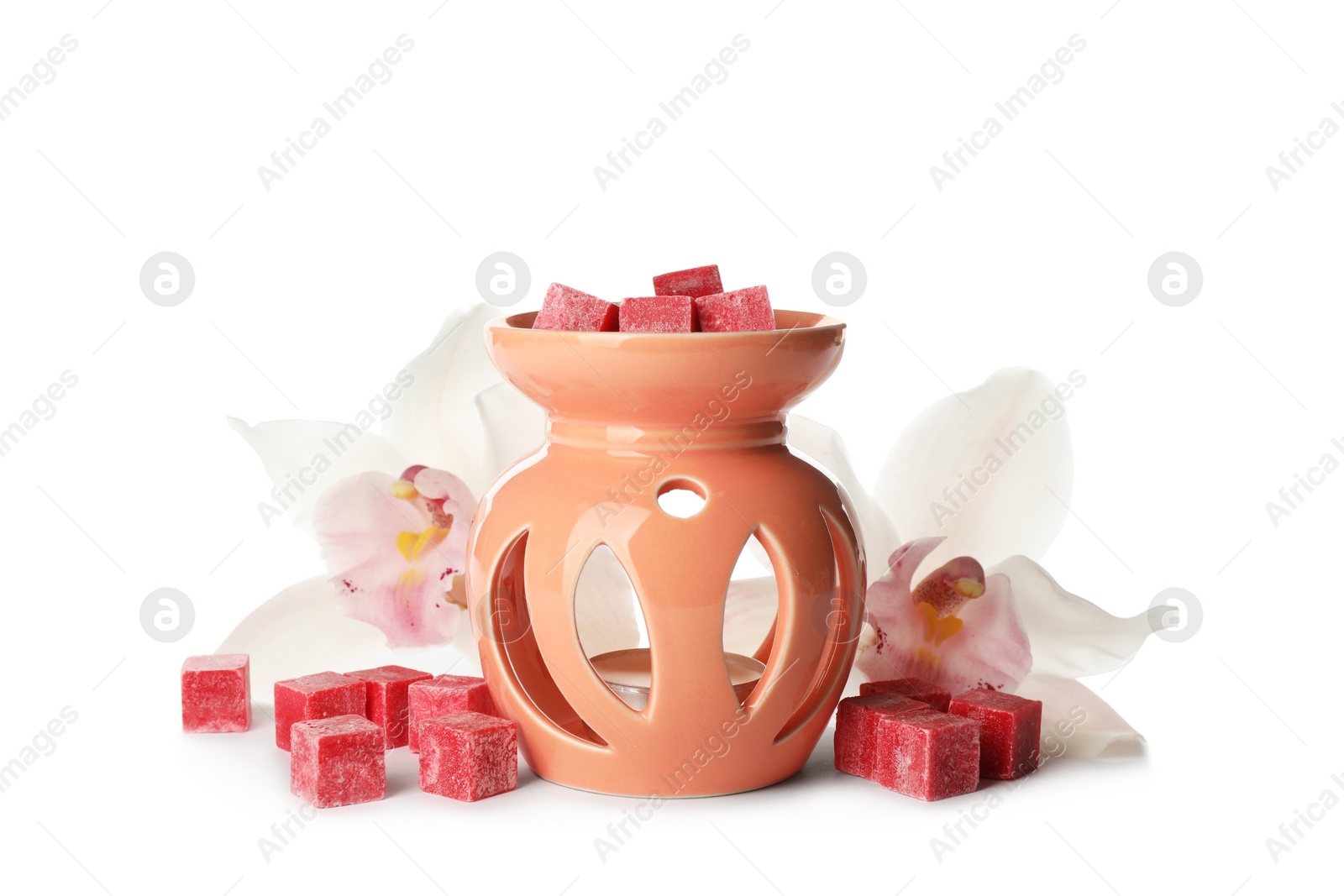 Photo of Stylish aroma lamp with essential wax cubes and flowers on white background