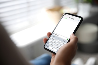 Image of Man sending message with text I Love You, closeup