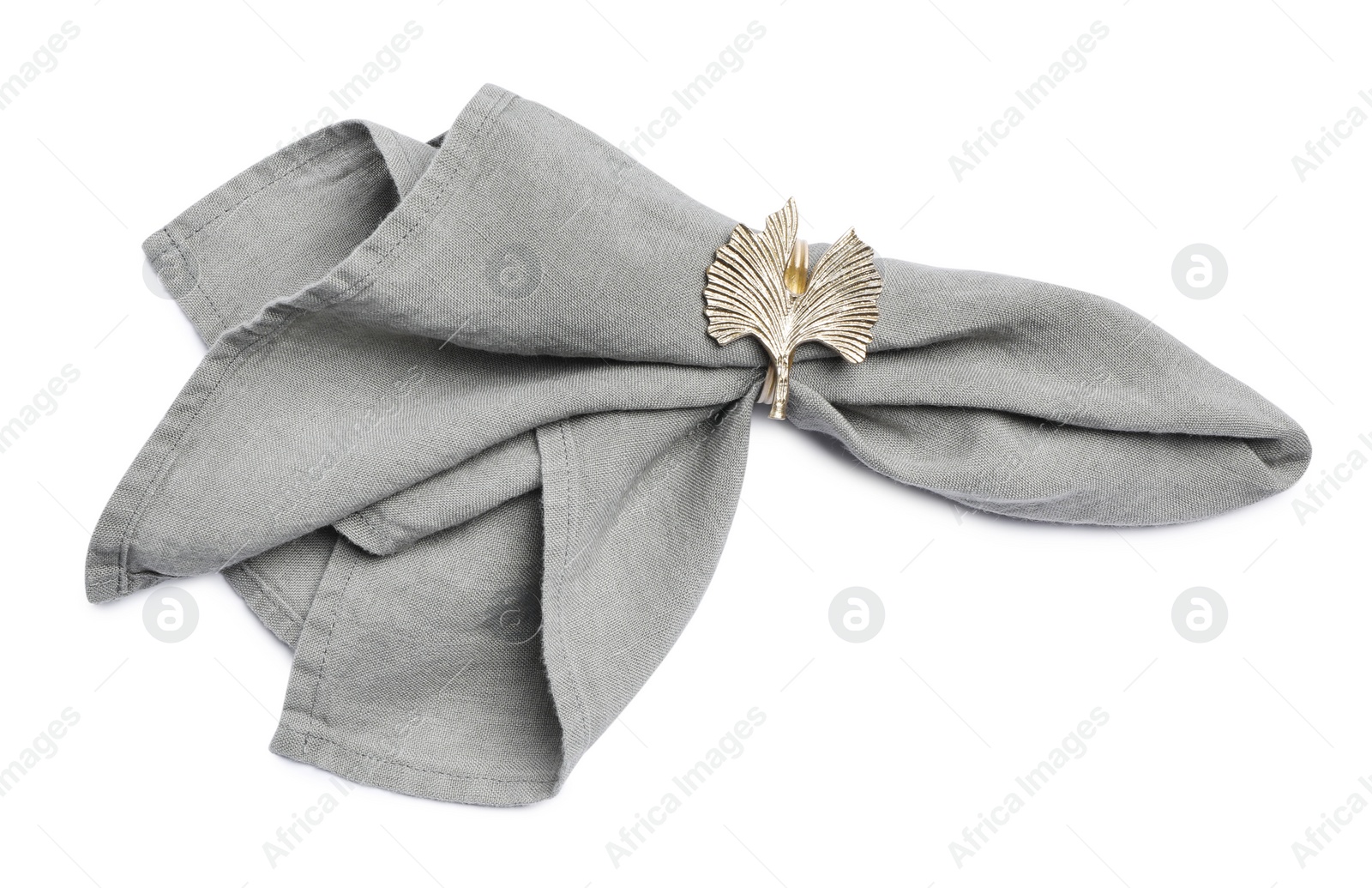 Photo of Fabric napkin with decorative ring for table setting on white background, top view