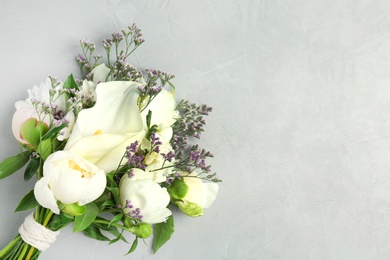 Photo of Bouquet of beautiful fragrant flowers on table