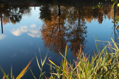 Photo of Picturesque view of lake on autumn day