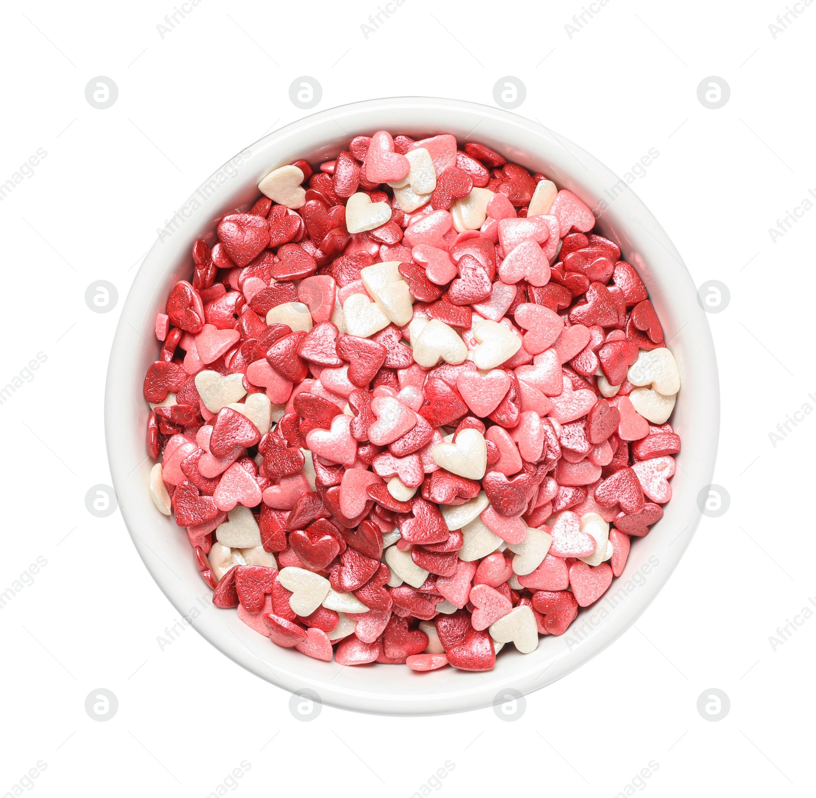 Photo of Sweet candy hearts in bowl on white background, top view