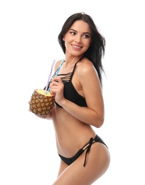 Beautiful young woman in black bikini with cocktail on white background