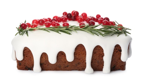 Photo of Traditional classic Christmas cake decorated with cranberries and rosemary isolated on white