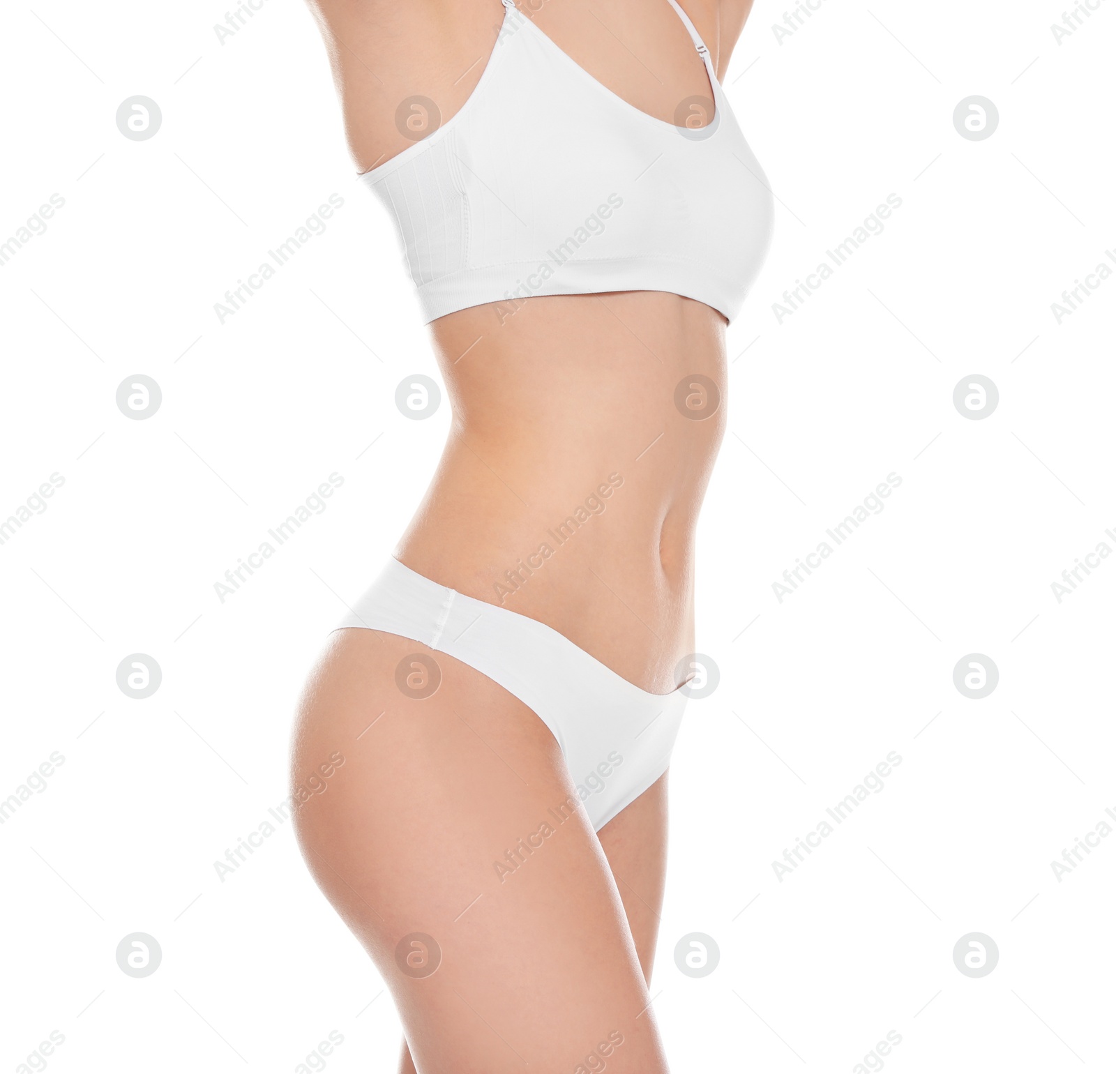 Photo of Slim young woman with smooth gentle skin on white background. Beauty and body care concept