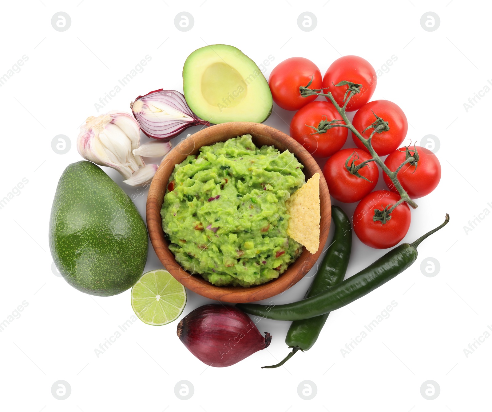 Photo of Delicious guacamole with nachos chips and ingredients isolated on white, top view