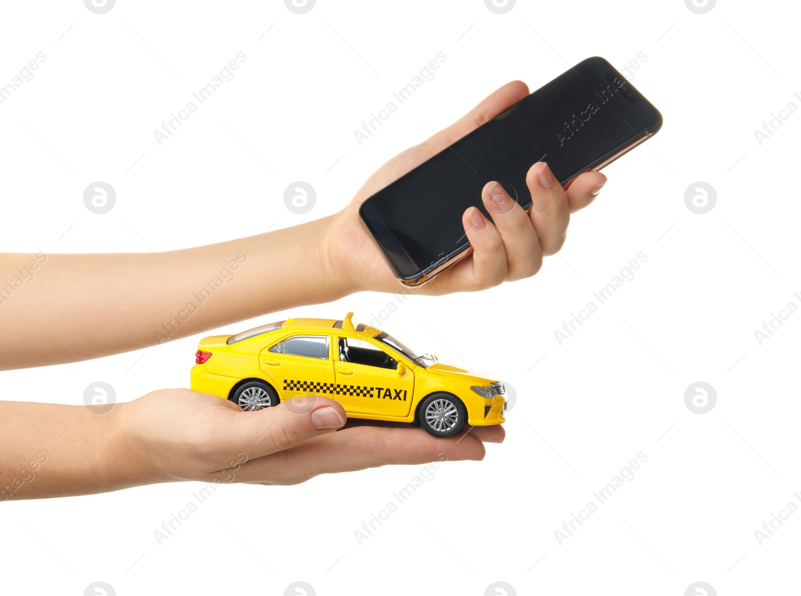 Photo of Woman with taxi car model and smartphone on white background, closeup. Space for design