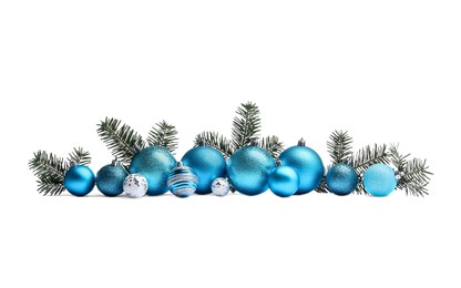 Photo of Beautiful Christmas balls and fir twigs isolated on white