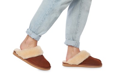 Woman in soft slippers on white background, closeup