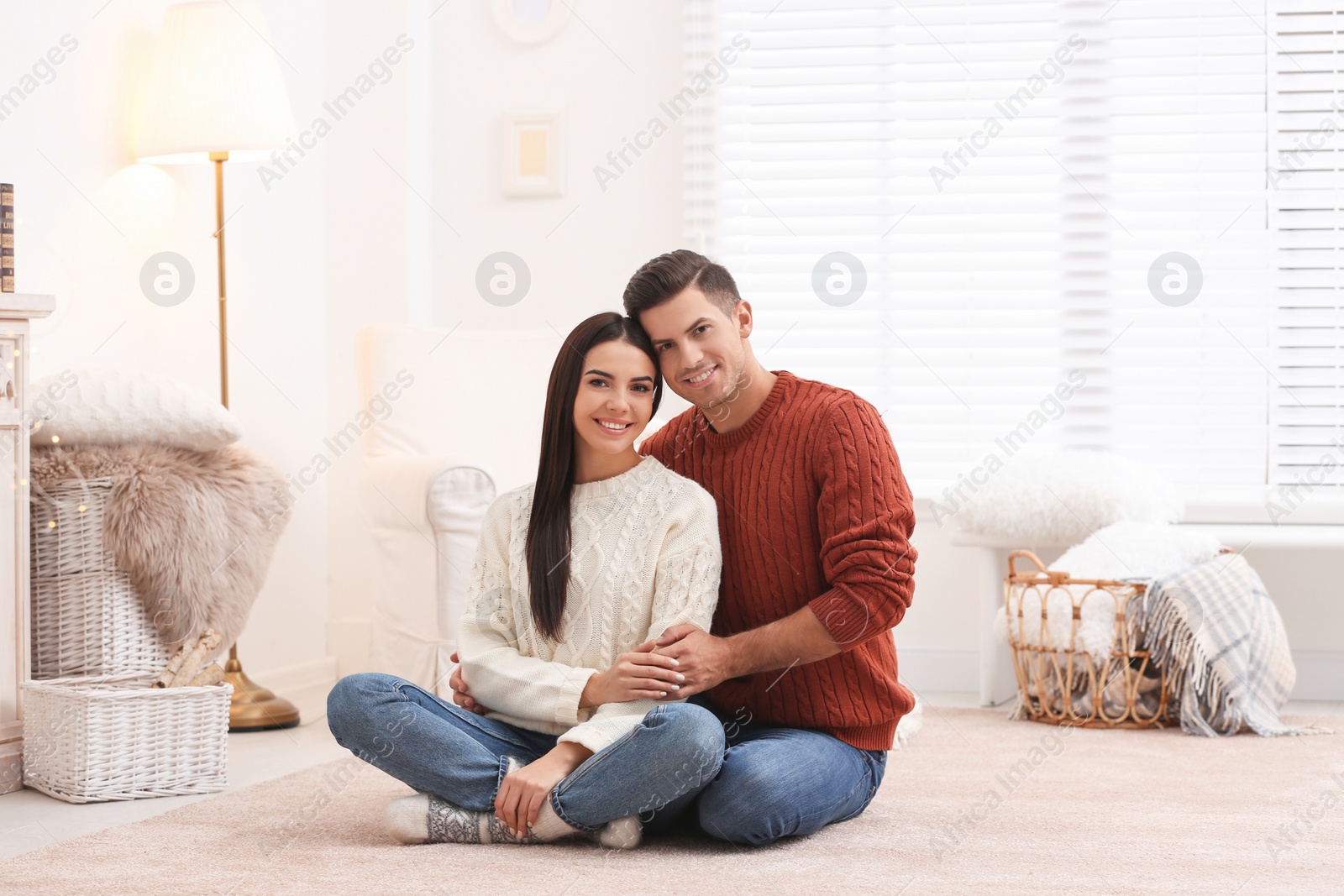 Photo of Happy couple spending time together at home. Winter vacation