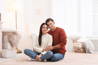 Happy couple spending time together at home. Winter vacation