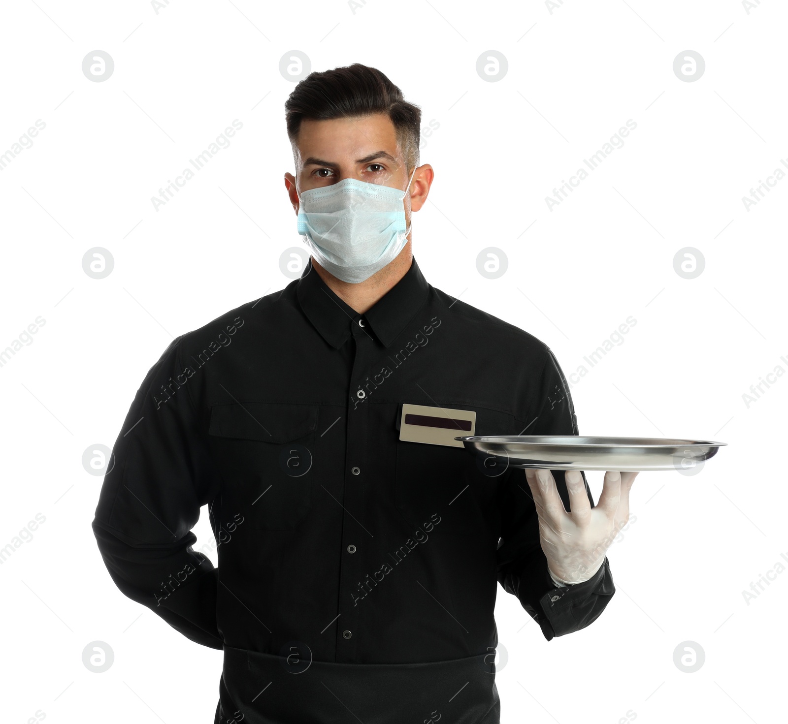 Photo of Waiter in medical face mask holding tray on white background