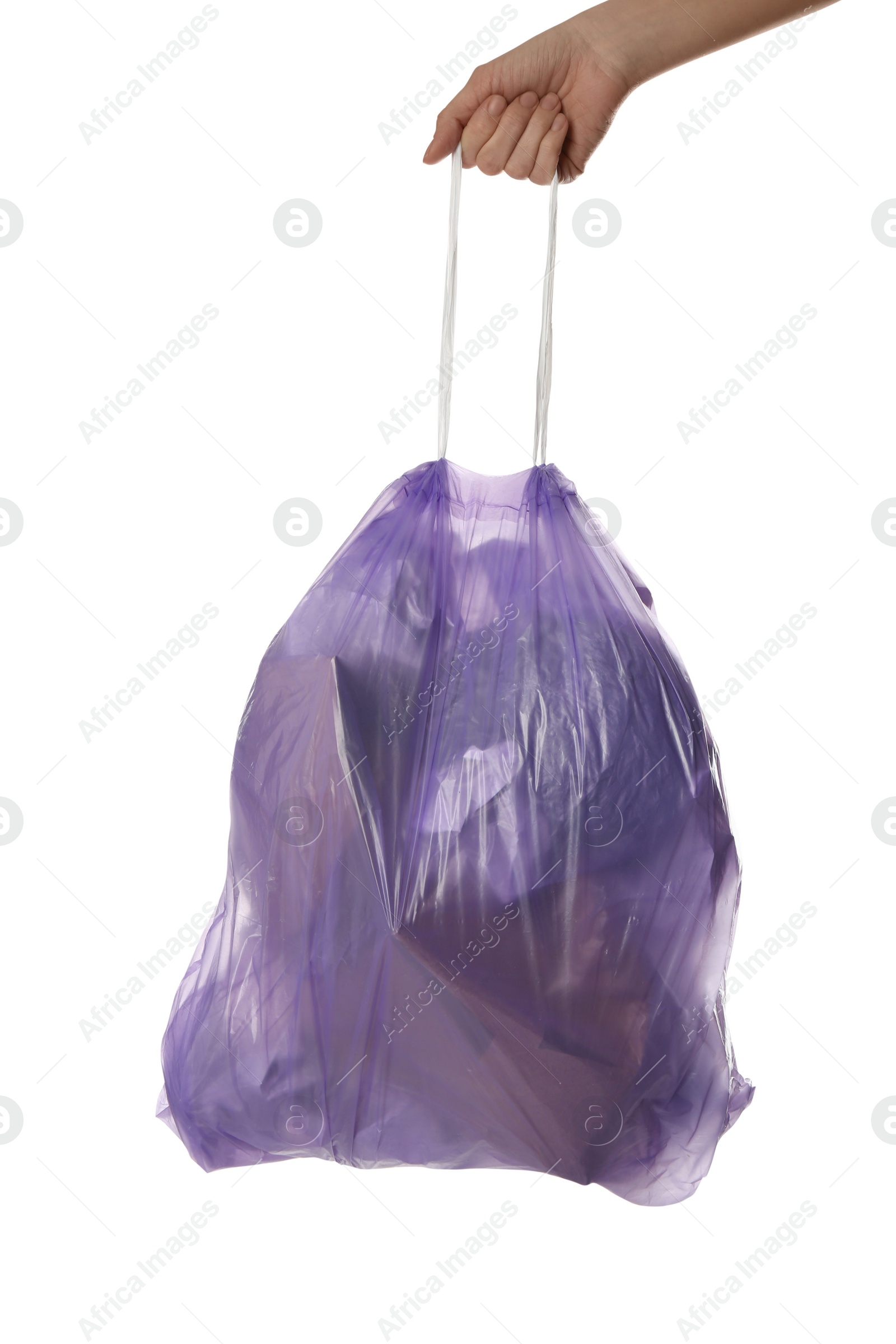 Photo of Woman holding trash bag filled with garbage on white background, closeup