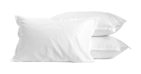 Photo of Many new soft pillows isolated on white