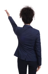 Photo of Businesswoman in suit pointing at something on white background, back view