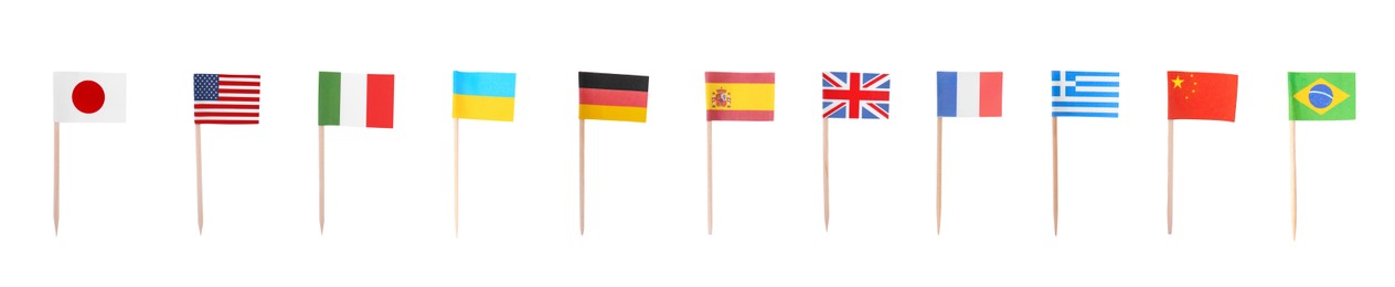 Image of Set of toothpicks with flags of different countries on white background. Banner design