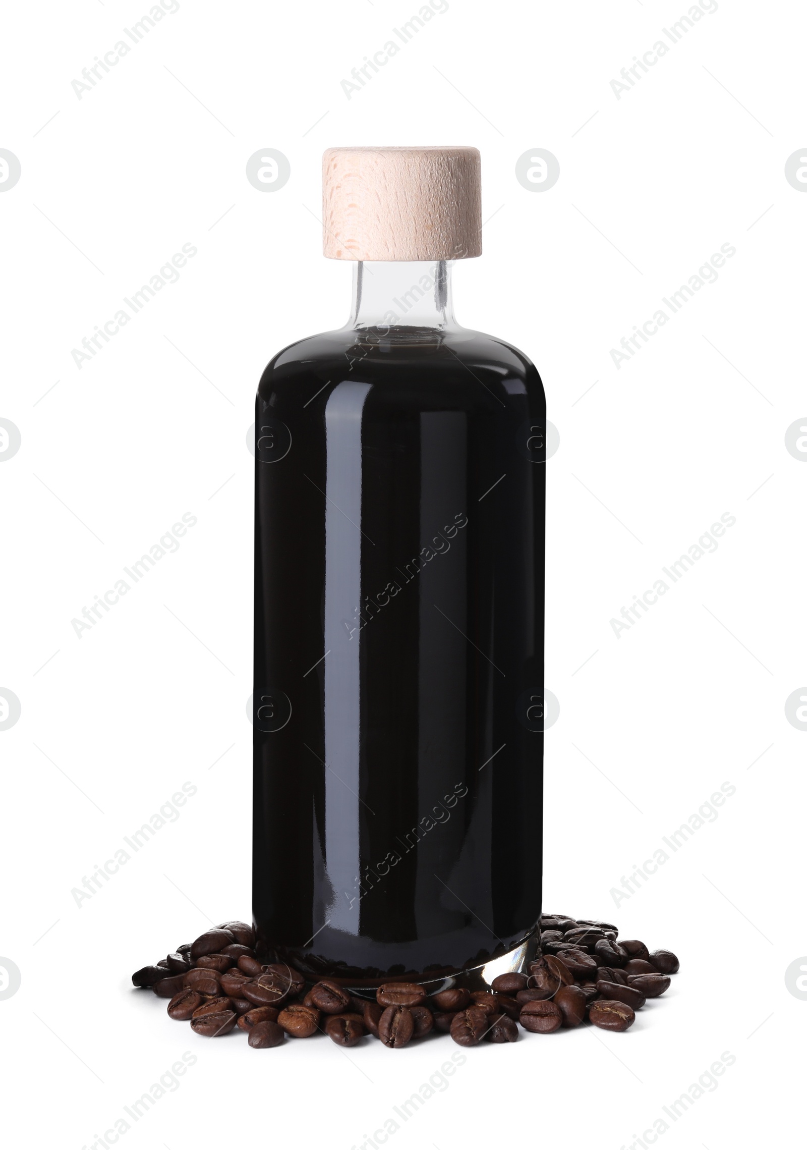 Photo of Bottle with coffee liqueur and beans isolated on white