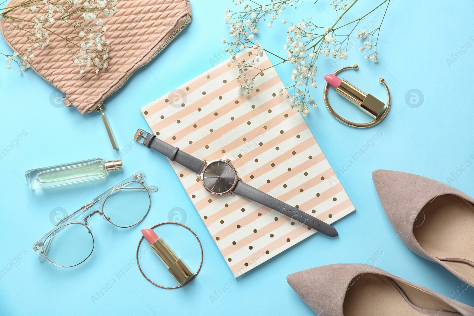 Photo of Flat lay composition with cosmetics and stylish accessories on color background