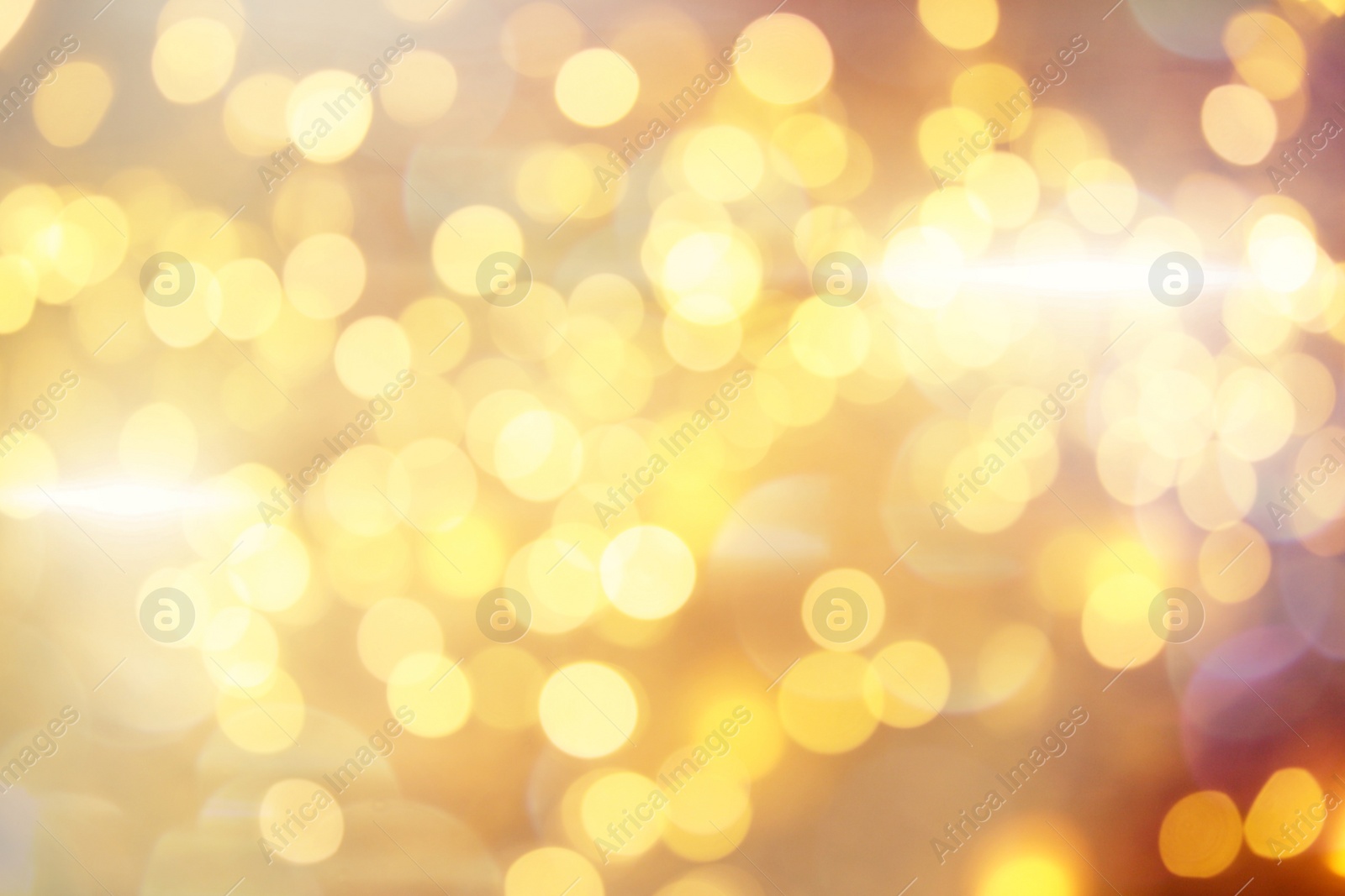 Image of Beautiful abstract background with defocused golden lights