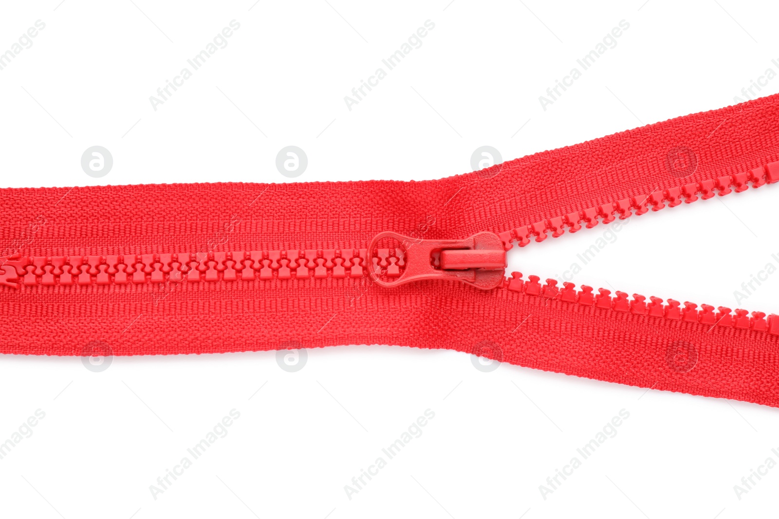 Photo of Red zipper on white background, top view