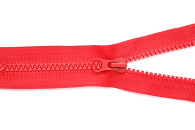 Red zipper on white background, top view