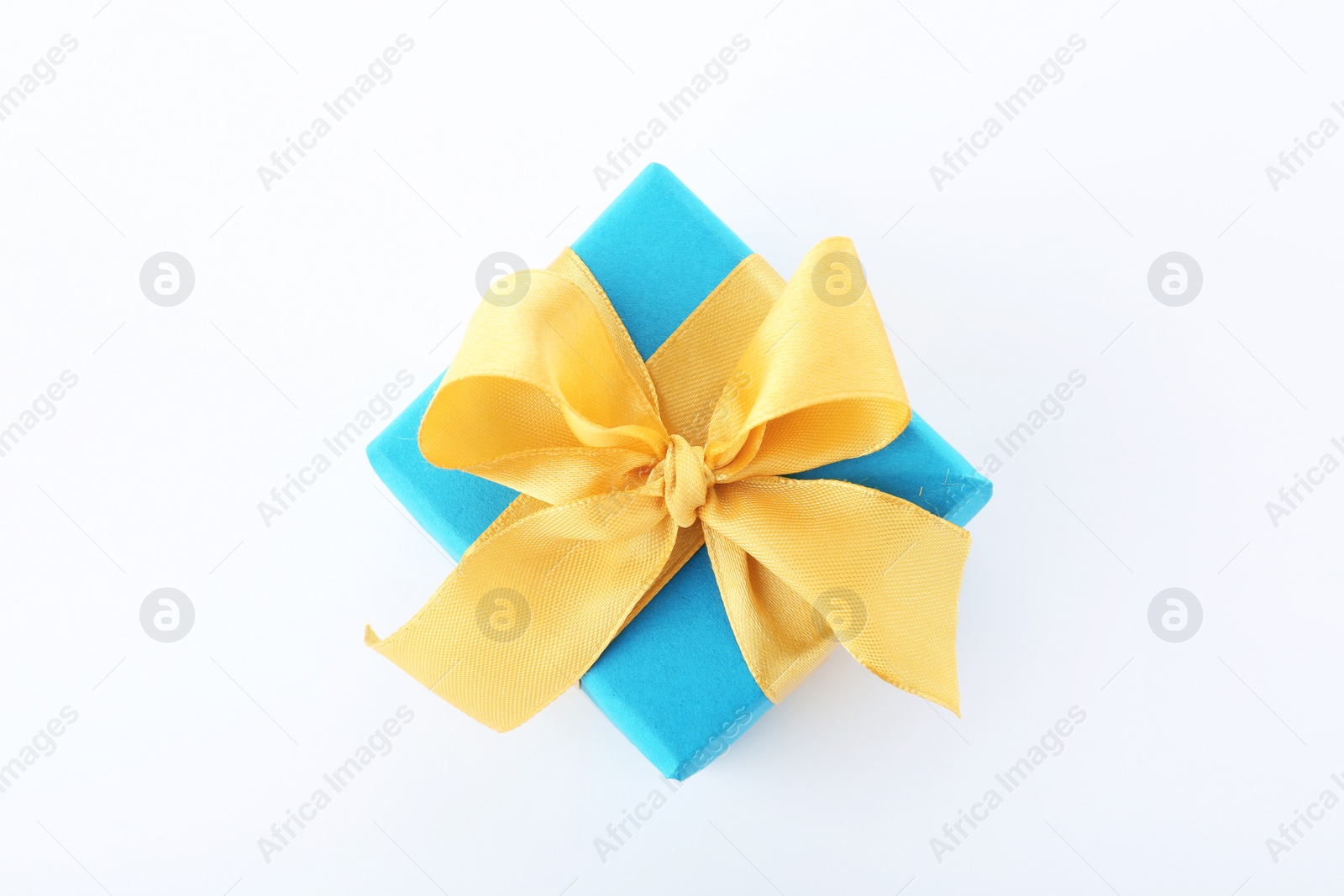 Photo of Beautiful gift box with ribbon on white background