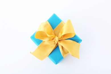 Photo of Beautiful gift box with ribbon on white background