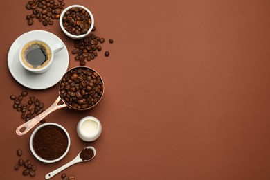 Flat lay composition with ground coffee and roasted beans on brown background, space for text