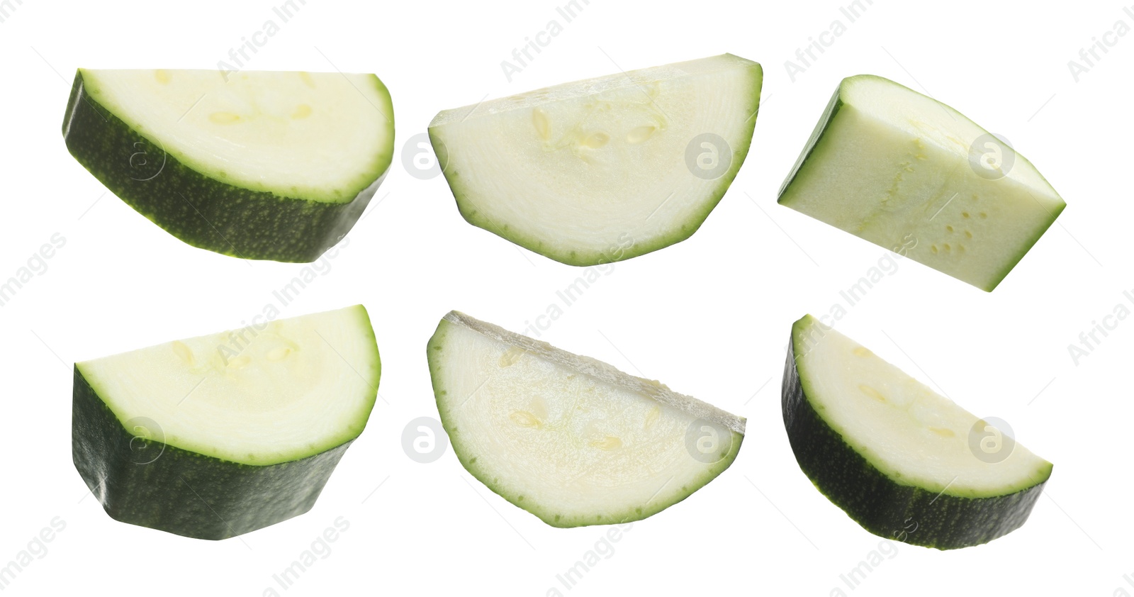 Image of Set with pieces of fresh ripe zucchini on white background