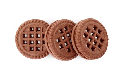 Tasty chocolate sandwich cookies with cream isolated on white, top view