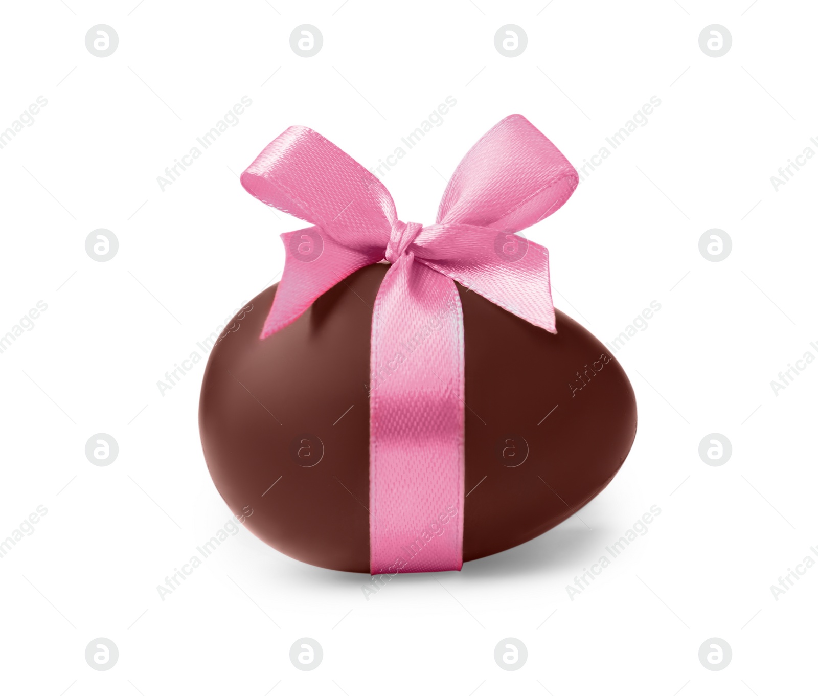 Photo of Sweet chocolate egg with pink bow isolated on white