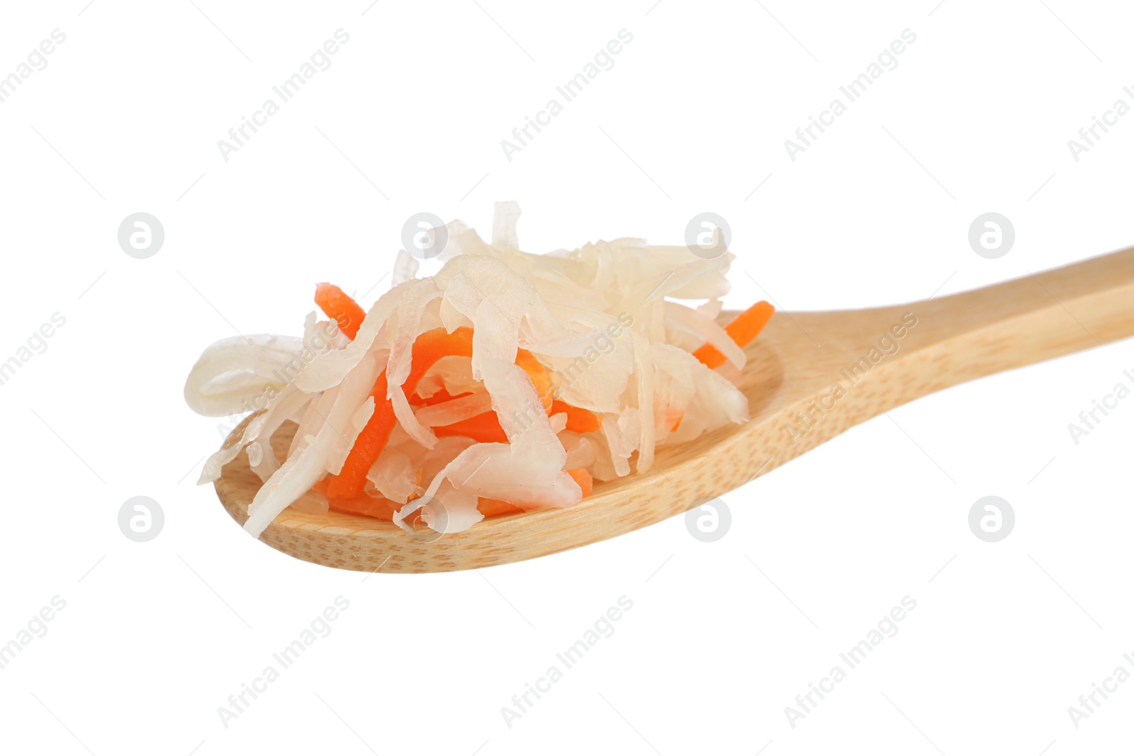 Photo of Wooden spoon of tasty fermented cabbage with carrot on white background