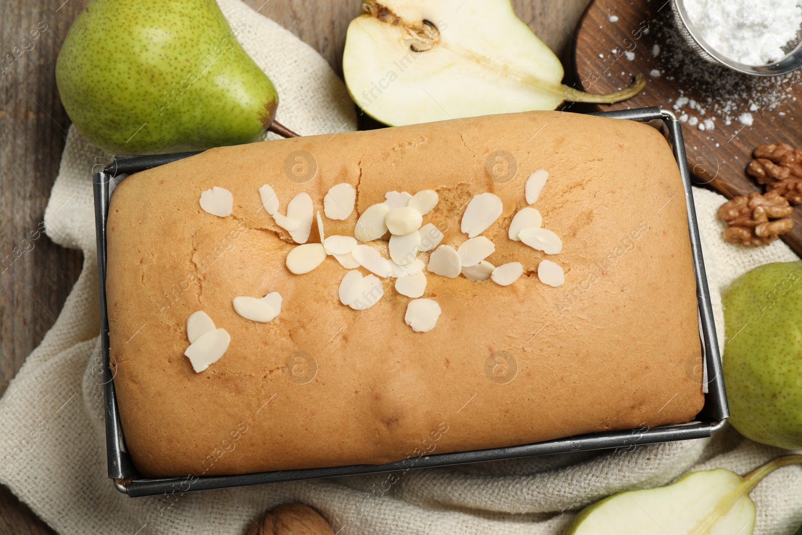 Photo of Flat lay composition with pear bread on table, closeup. Homemade cake