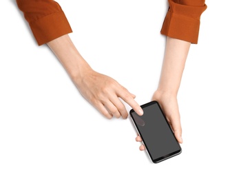 Photo of Woman with smartphone on white background, top view. Closeup of hands